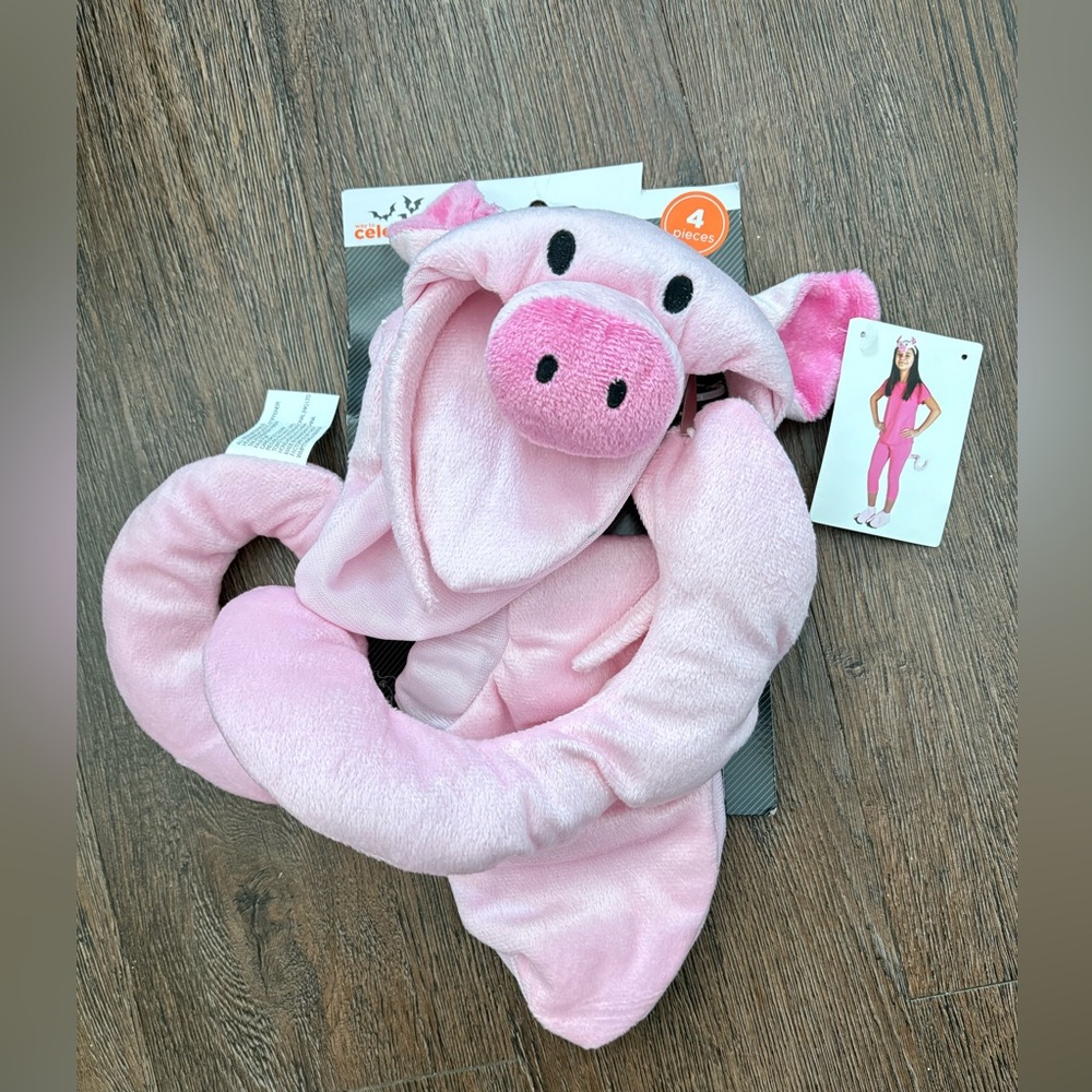 Brand new children’s 4 piece pig costume accessory set. Headband, tail, slippers